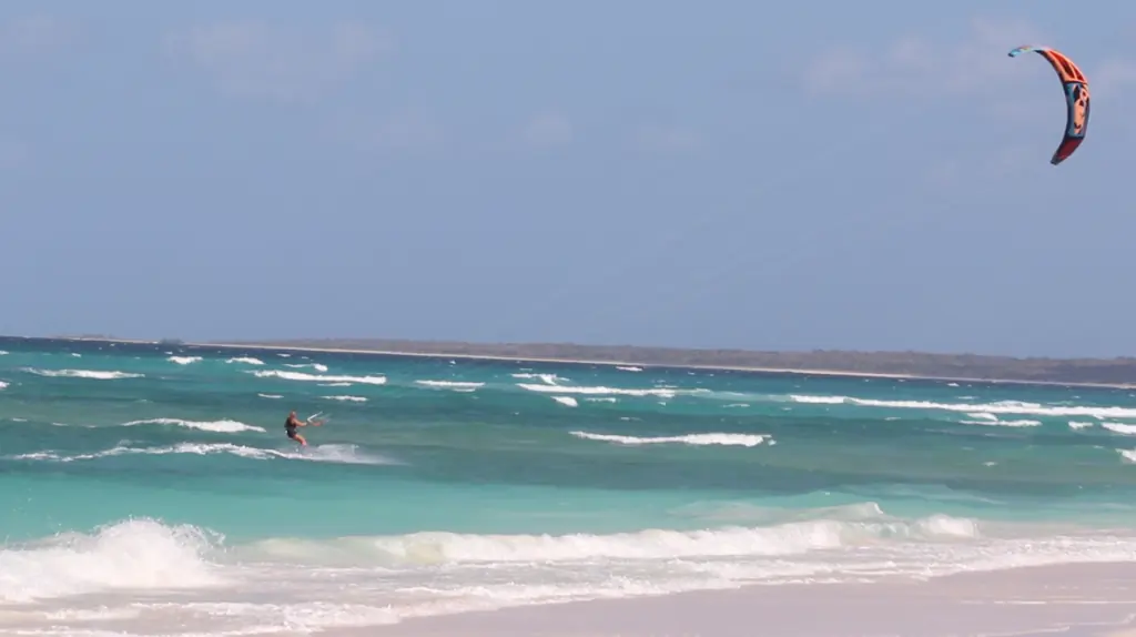 Kitesurfer on the lagoon in front of Nemberala beach, Rote Island