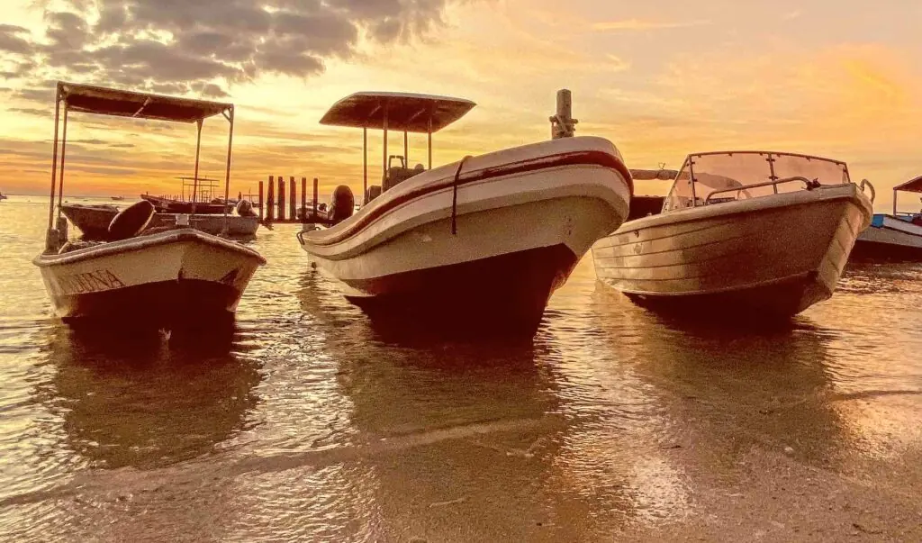 Manduna Resort surf boats at sunset in Nemberala