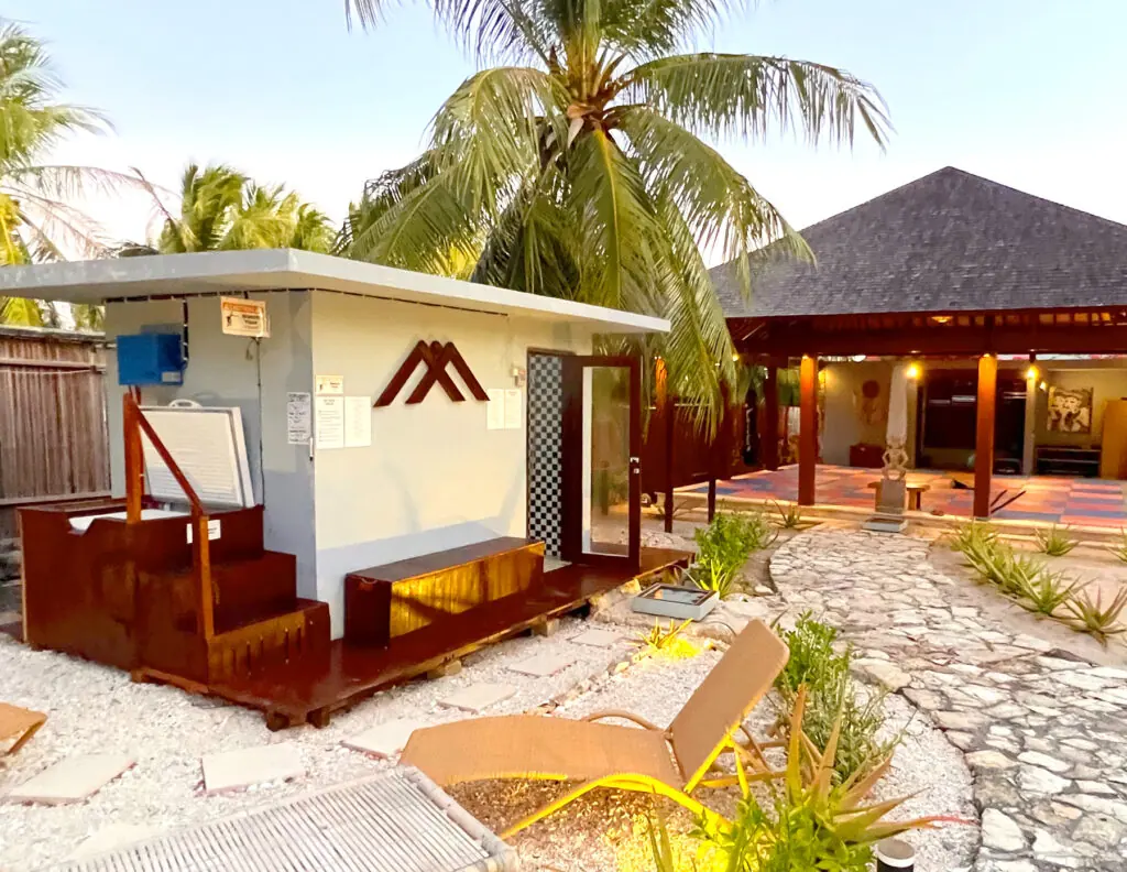 Steam sauna and ice bath hut by the pool at Manduna Resort